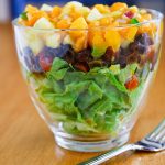 Layered Salad with Black Beans and Mango-Cucumber Salsa
