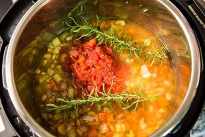 Tuscan white bean soup being prepared in the Instant Pot